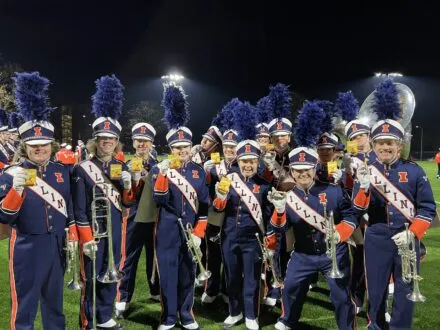 Marching Illini holding their ChopSavers