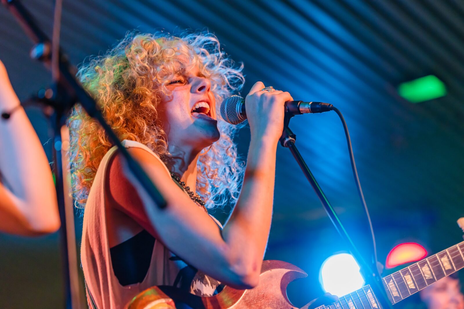 Woman singing on stage