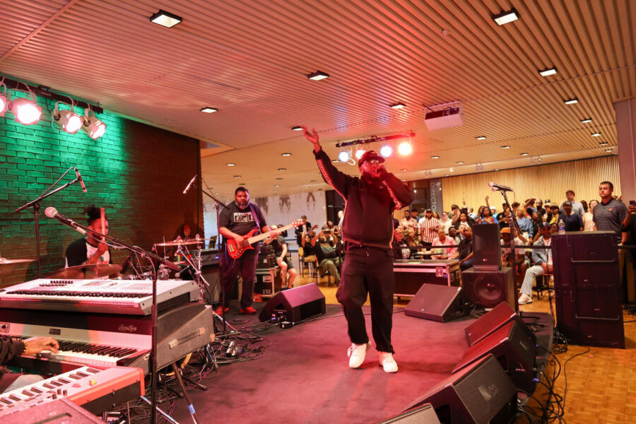 man on stage with a microphone